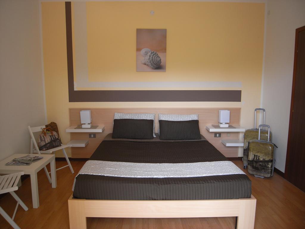 Hotel Moreri Grado Ruang foto