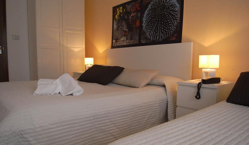 Hotel Moreri Grado Bagian luar foto